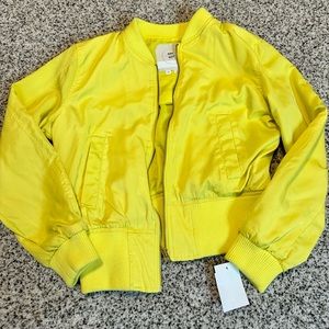 yellow zip up jacket